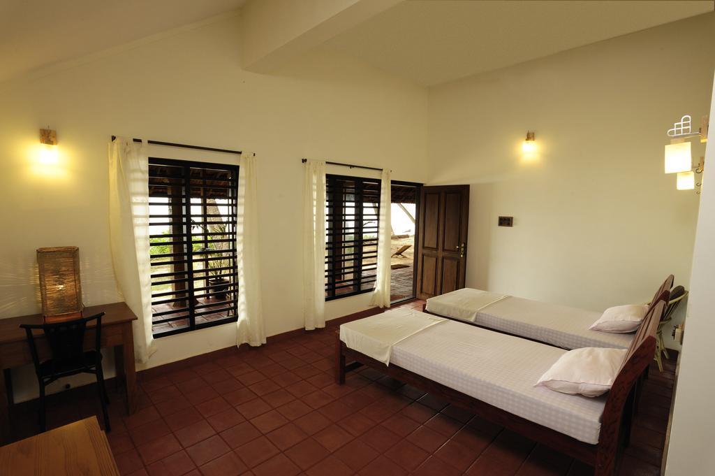 Chera Rocks Beach House Hotel Thottada Bilik gambar
